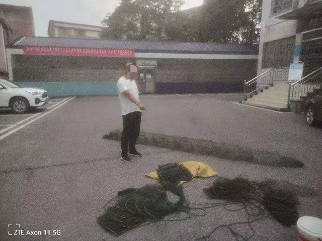 顶风作案！男子湘江“地笼”捕鱼被湘潭县警方刑拘