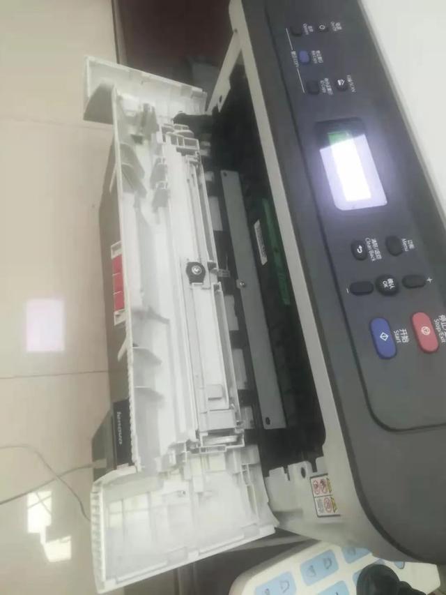 m7400pro更换墨粉，lenovom7400pro打印机怎么清零？