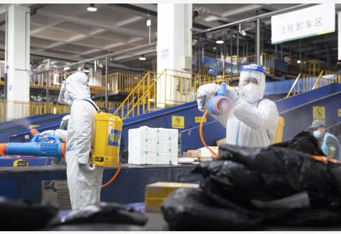 “双十一”你的快递在这“洗个澡”