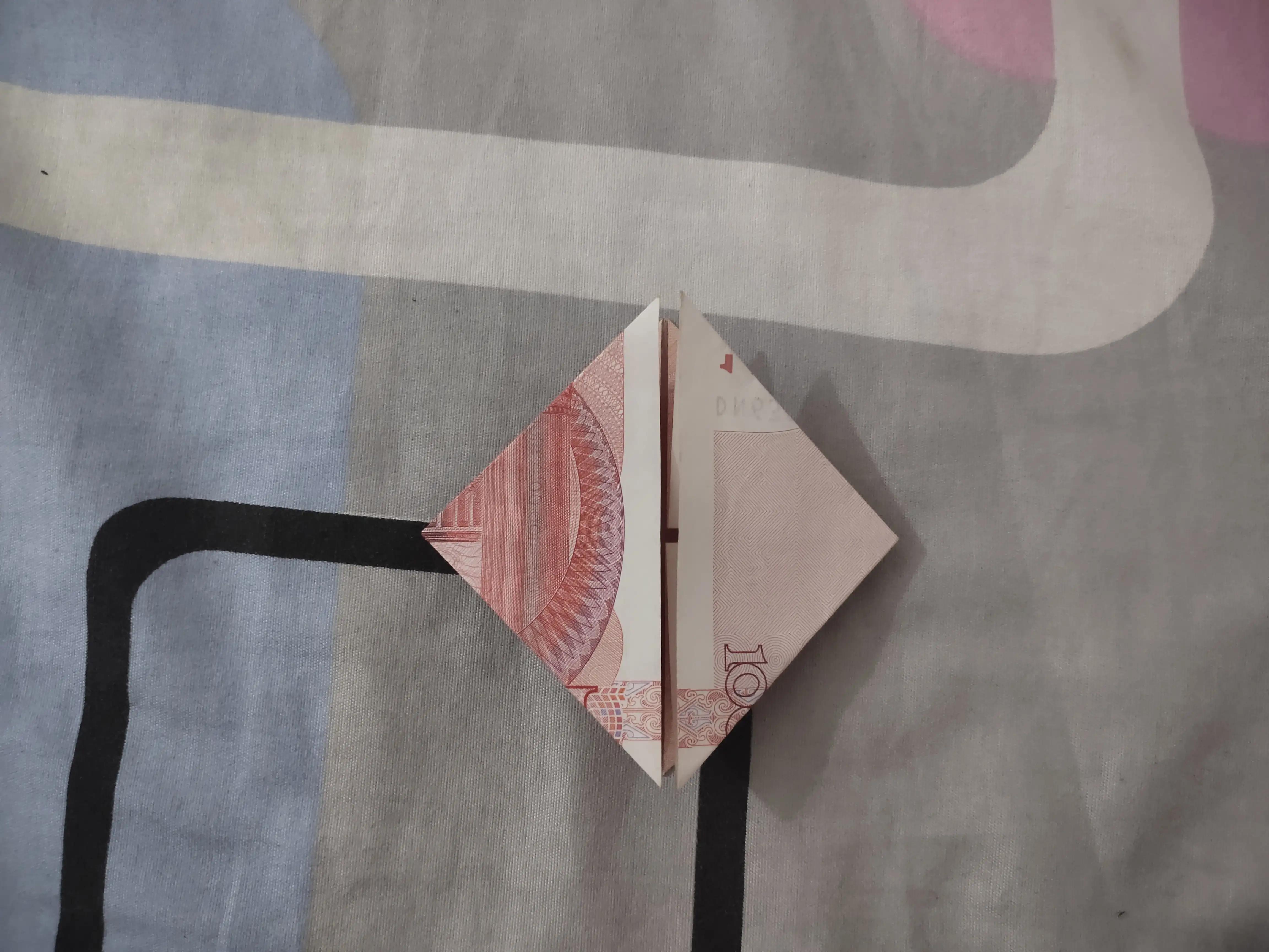 100元折爱心的步骤图解小朋友都能学会的教程