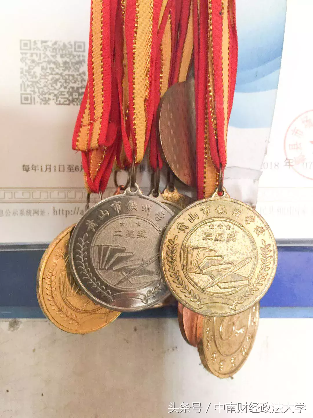 校长签发的第一张本科新生录取通知书 中南财经政法大学送给了“独臂少年”