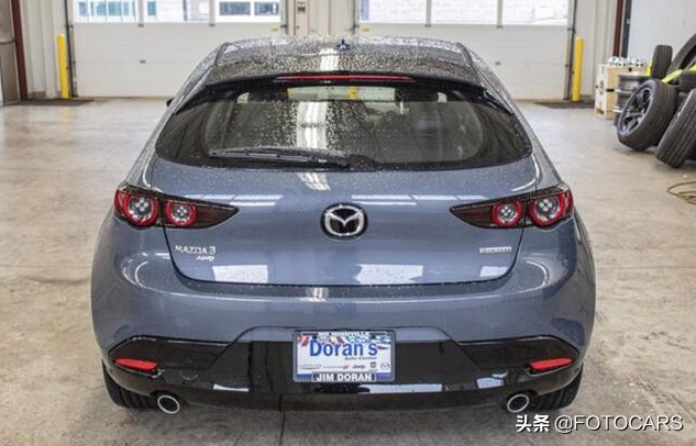 新款马自达3两厢版，后排搞不过高尔夫，外型相当出众