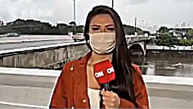 CNN女记者直播报道巴西洪水 流浪汉闯进镜头持刀抢走她的两部手机