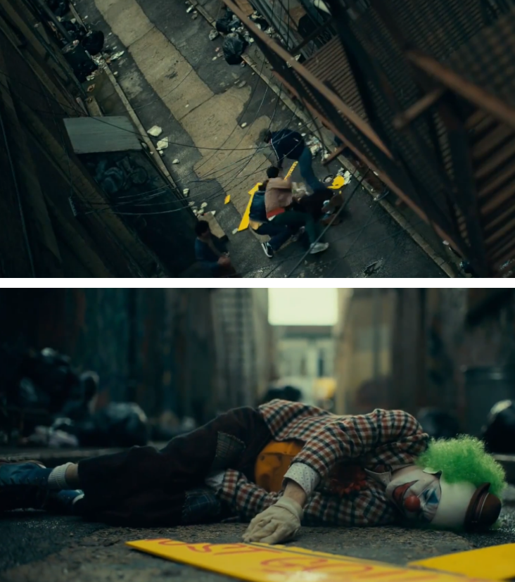 显得格格不入,直到他被几个小混混欺负,倾斜的俯拍镜头,贴地的镜头,让