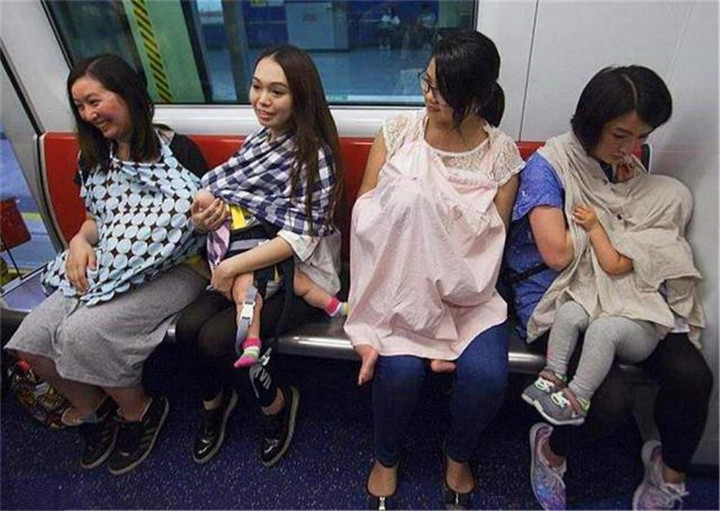 哺乳图片(宝妈地铁上给孩子喂母乳) - 赤虎壹号