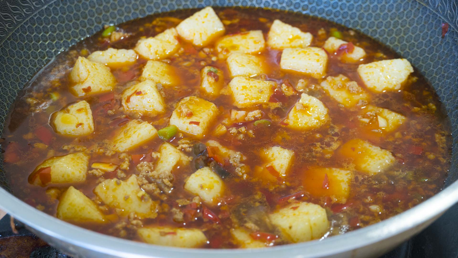 米豆腐怎么做（轻松做出筋道爽滑的米豆腐）