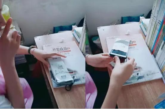 班主任上课突然查手机，普通学生只会放兜里，这种操作才最秀