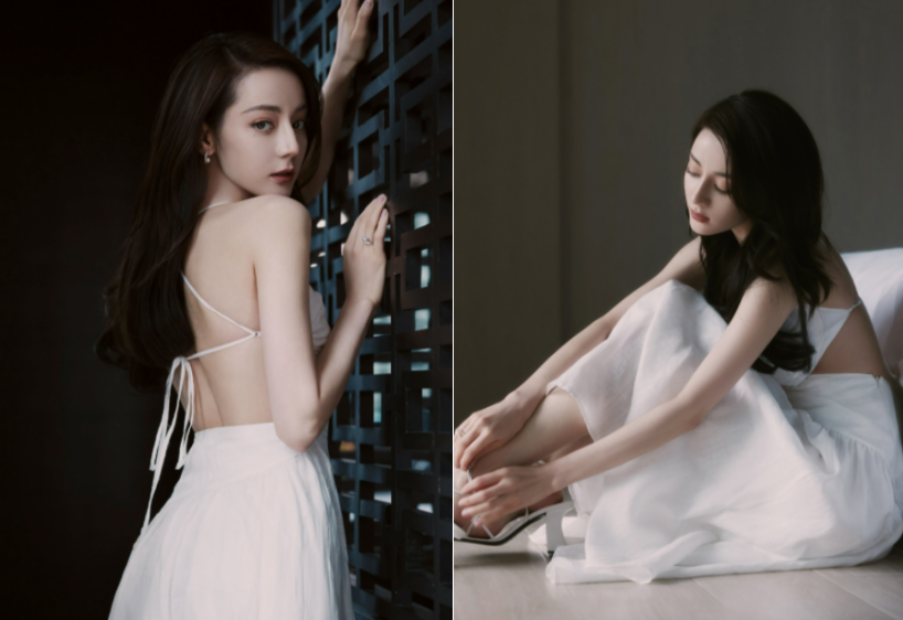 迪丽热巴坐地上拍照!穿露背长裙骨头突出,腰太细用2个夹子固定