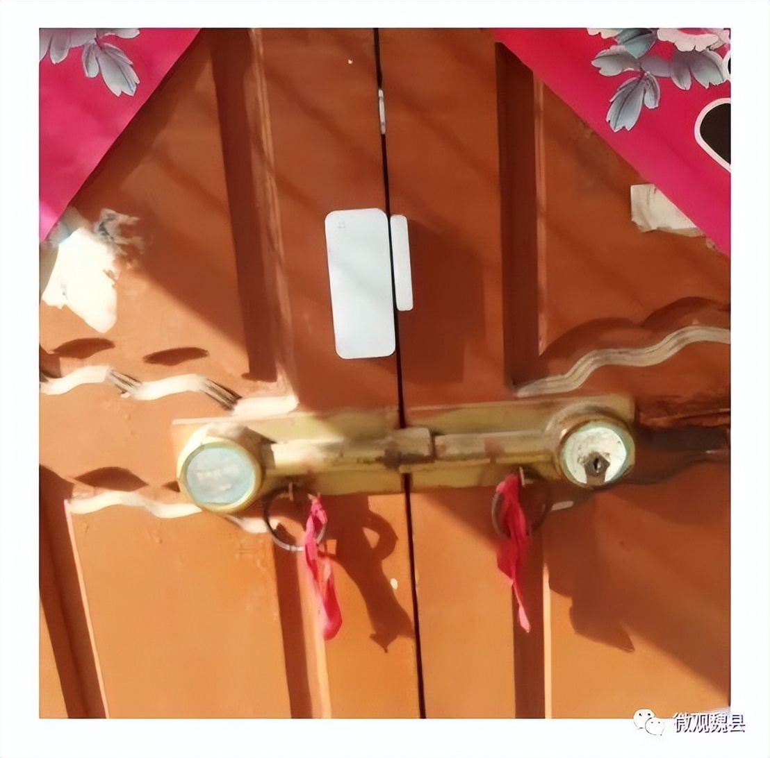 “小門神”大作用 魏縣牙里鎮為居家隔離人員安裝智能門磁感應設備