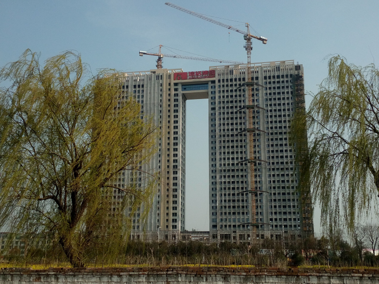 江苏信拓建设(集团)公司因违法造成火灾事故被处罚