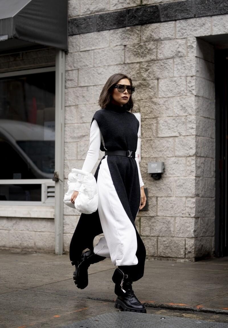 很多人在进行黑白色搭配的时候,始终都是窝在自己的舒适圈的,黑白色