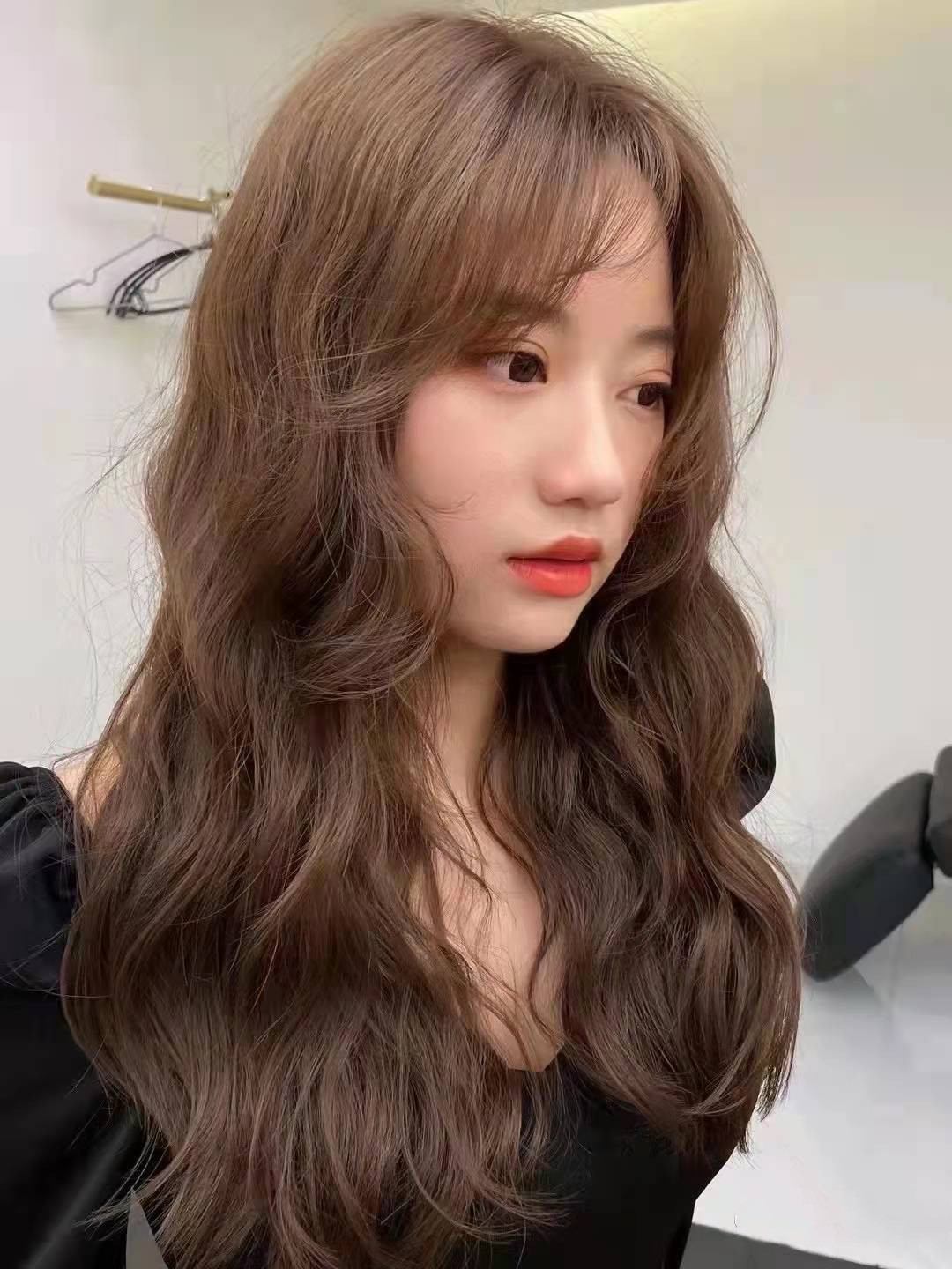 日系羊毛卷之所以比传统羊毛卷时尚减龄,一是因为卷形