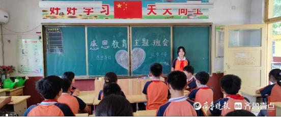 东昌府区梁水镇张樊小学里充溢满满感动(图1)